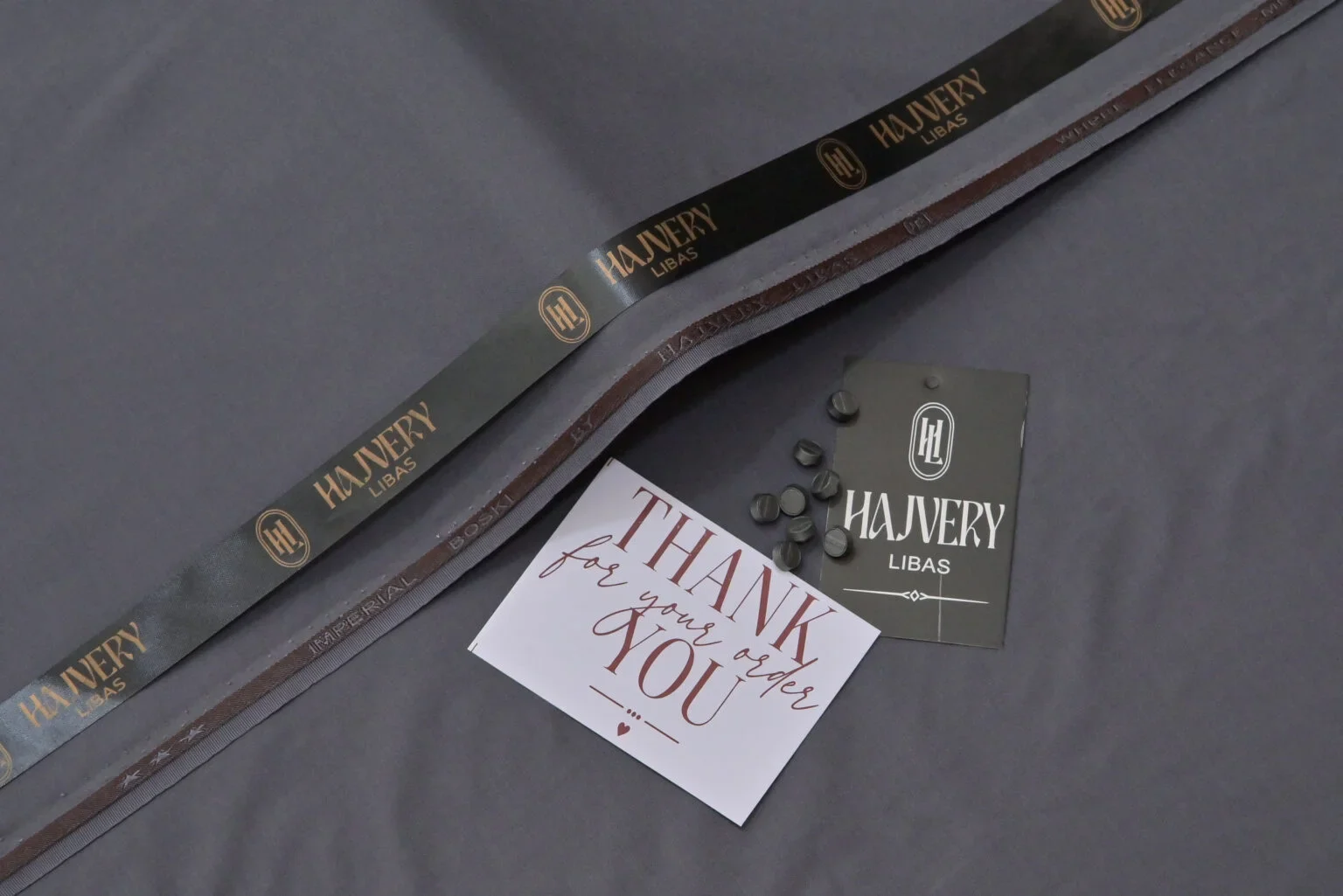 Premium fabric draped in ivory — the Hajvery Libas campaign